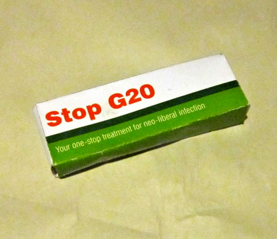 Front of G20 culture jam box. Text reads: Stop G20: Your one-stop treatment for neo-liberal infection.